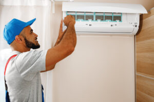 rsz professional repairman installing air conditioner 2023 11 27 05 27 26 utc